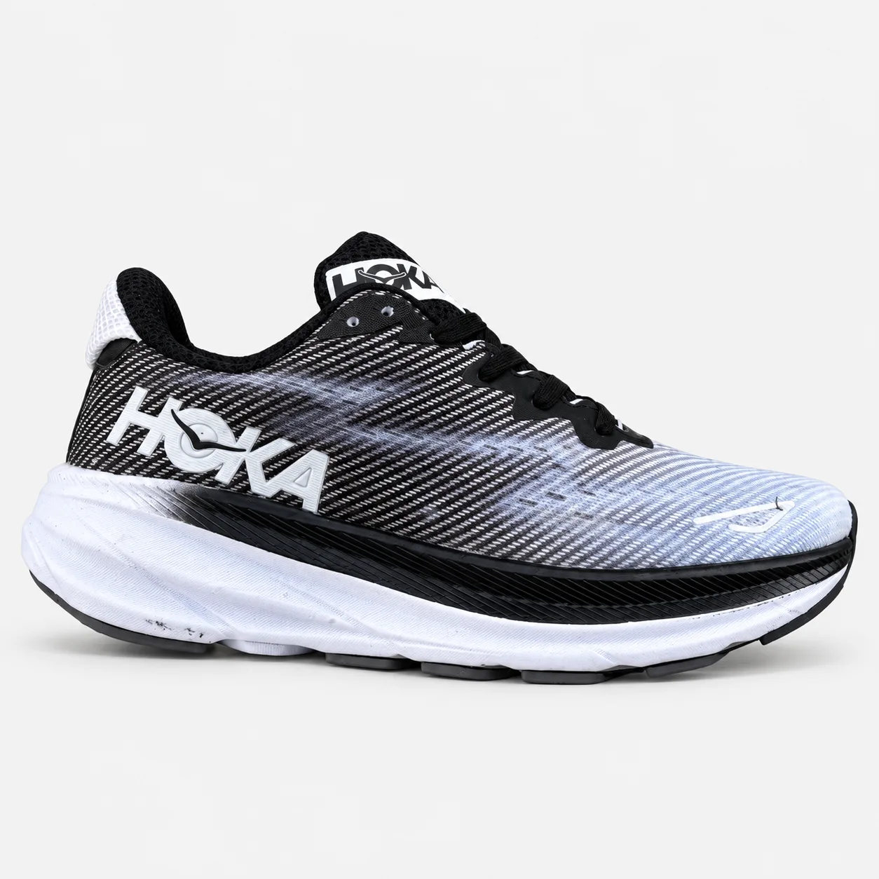 Hoka-style sports running and comfort sneakers (Master grade quality) Model 2115 Black & White heroshoop.com view 1 Hoka-style-sports-running-and-comfort-sneakers-Master-grade-quality-Model-2115-Black-White-heroshoop.com-view-1.webp