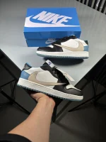 Jordan-One-Low-Travis-Scott-White-Black-Nike-Cream-Code-1178-heroshoop-view-1.webp