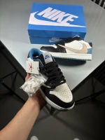 Jordan-One-Low-Travis-Scott-White-Black-Nike-Cream-Code-1178-heroshoop-view-2.webp