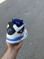 Nike-Jordan-4-White-Blue-Sneakers-heroshoop-view-3.webp