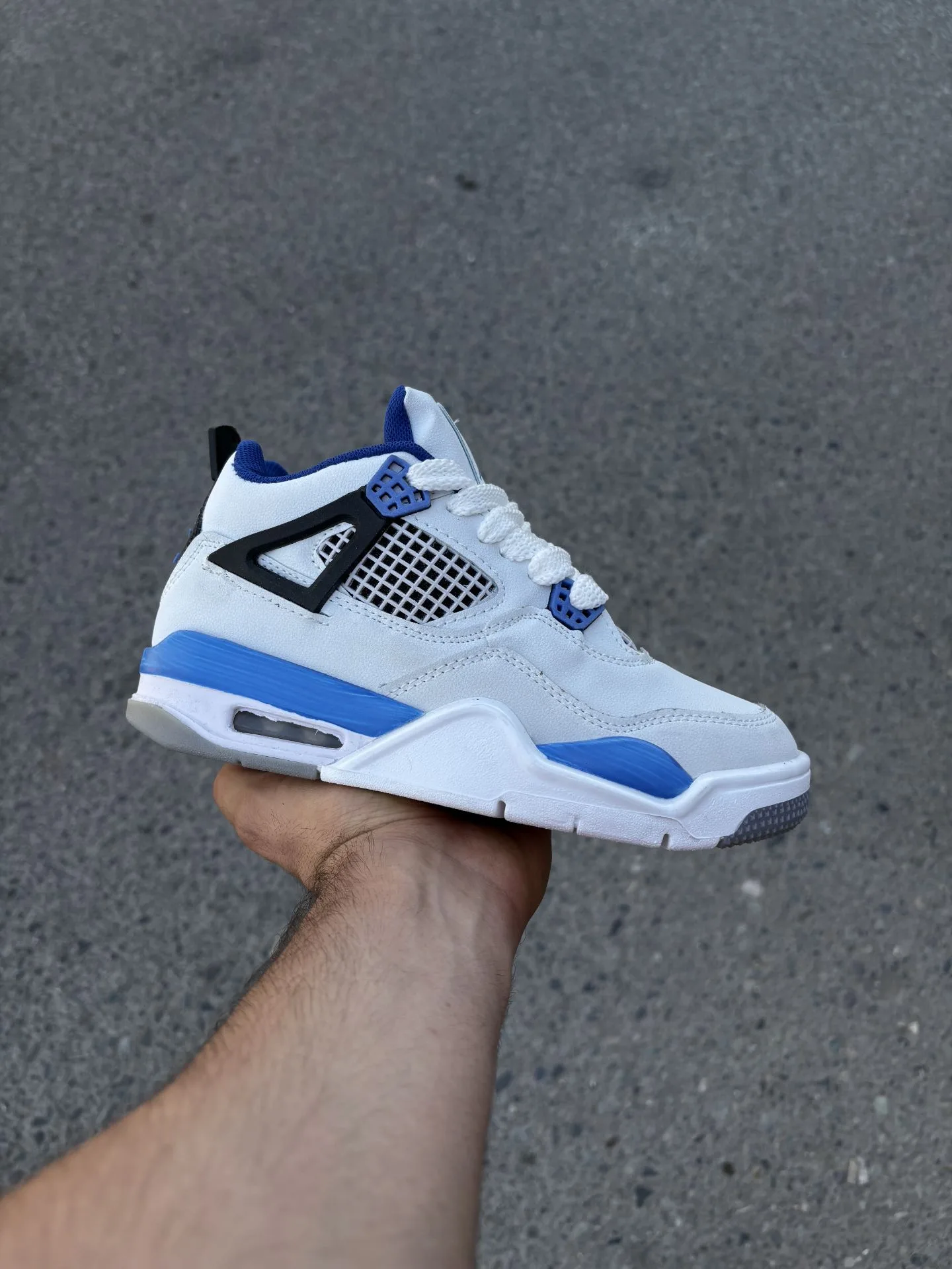 Nike Jordan 4 White Blue Sneakers heroshoop Nike-Jordan-4-White-Blue-Sneakers-heroshoop.webp