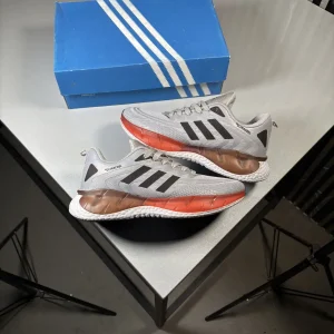 Adidas-Climacool-grey-and-orange-running-and-casual-sneakers-heroshoop.webp