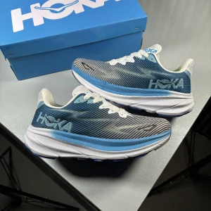 Hoka-model-comfortable-running-shoes-blue-white-gray-heroshoop.webp