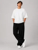 Natural-Lyocell-fabric-half-bag-pants-long-length-108-black-color-with-cocoon-heroshoop-view-1.webp