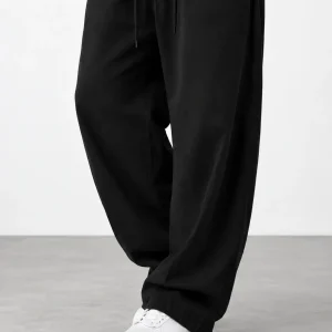 Natural Lyocell fabric semi-bag trousers Long length (108 cm) Solid black heroshoop.com view1.png
