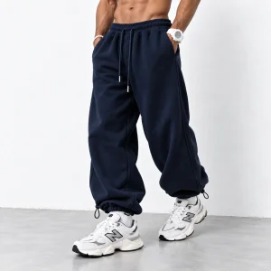 Baggy-Joggers-3-thread-French-terry-cotton-fabric-Length-110-cm-Elastic-waistband-Adjustable-toggle-cuffs-Color-Navy-blue-Code-8005-www.heroshoop.com-view-1-1.webp