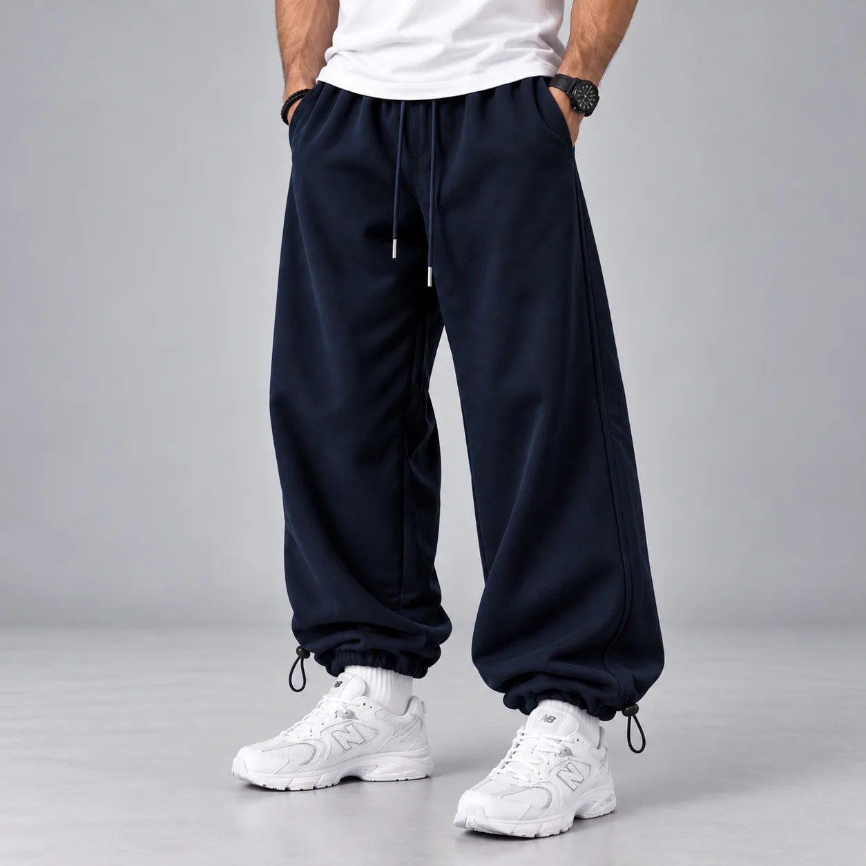 Baggy-style joggers 3-thread French terry cotton Elastic waistband Adjustable cuffs with stoppers Navy blue Code 8005 Length 110 www.heroshoop.com view 1 Baggy-style-joggers-3-thread-French-terry-cotton-Elastic-waistband-Adjustable-cuffs-with-stoppers-Navy-blue-Code-8005-Length-110-www.heroshoop.com-view-1.webp