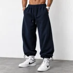 Baggy-style-joggers-3-thread-French-terry-cotton-Length-110-cm-Elastic-waistband-Adjustable-cuffs-with-toggles-Navy-blue-Code-8005-www.heroshoop.com-view-1.webp