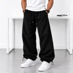 Baggy-style-joggers-3-thread-cotton-French-terry-fabric-Black-Dual-style-cuffs-fitted-or-loose-Code-8001-www.heroshoop.com-view-1-1.webp