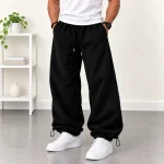 Baggy-style-joggers-Black-Adjustable-cuffs-with-toggles-3-thread-fleece-lined-cotton-Code-8001-www.heroshoop.com-view-1.webp