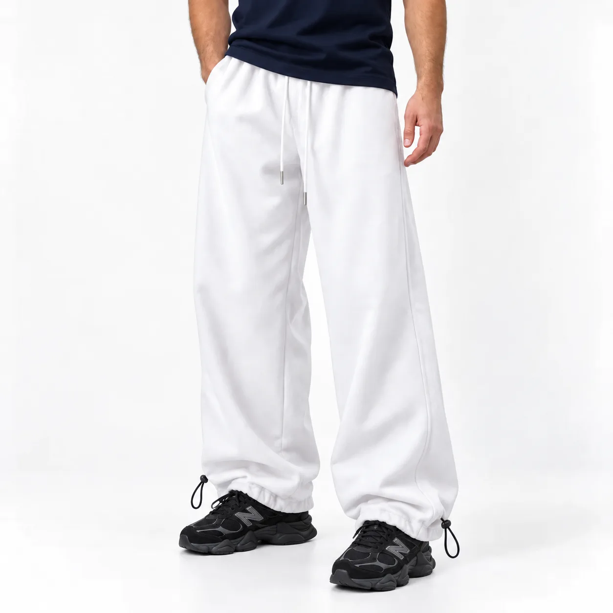 Baggy-style sporty joggers Adjustable hem (toggle) White 3-thread cotton French terry Unisex www.heroshoop.com view 1 Baggy-style-sporty-joggers-Adjustable-hem-toggle-White-3-thread-cotton-French-terry-Unisex-www.heroshoop.com-view-1.webp
