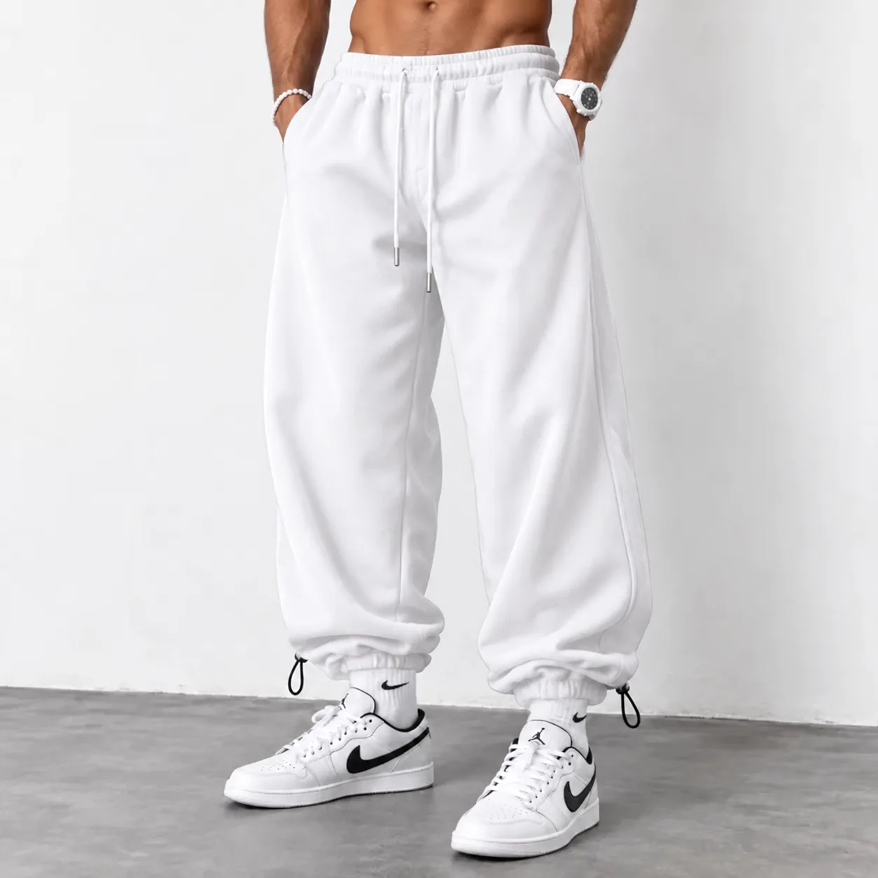 White Sport Jogger Pants Baggy Fit Premium 3-Thread Cotton Fleece Dual-Mode Adjustable Cuffs (with Stoppers) Master-Grade Quality www.heroshoop.com view 1 White-Sport-Jogger-Pants-Baggy-Fit-Premium-3-Thread-Cotton-Fleece-Dual-Mode-Adjustable-Cuffs-with-Stoppers-Master-Grade-Quality-www.heroshoop.com-view-1.webp